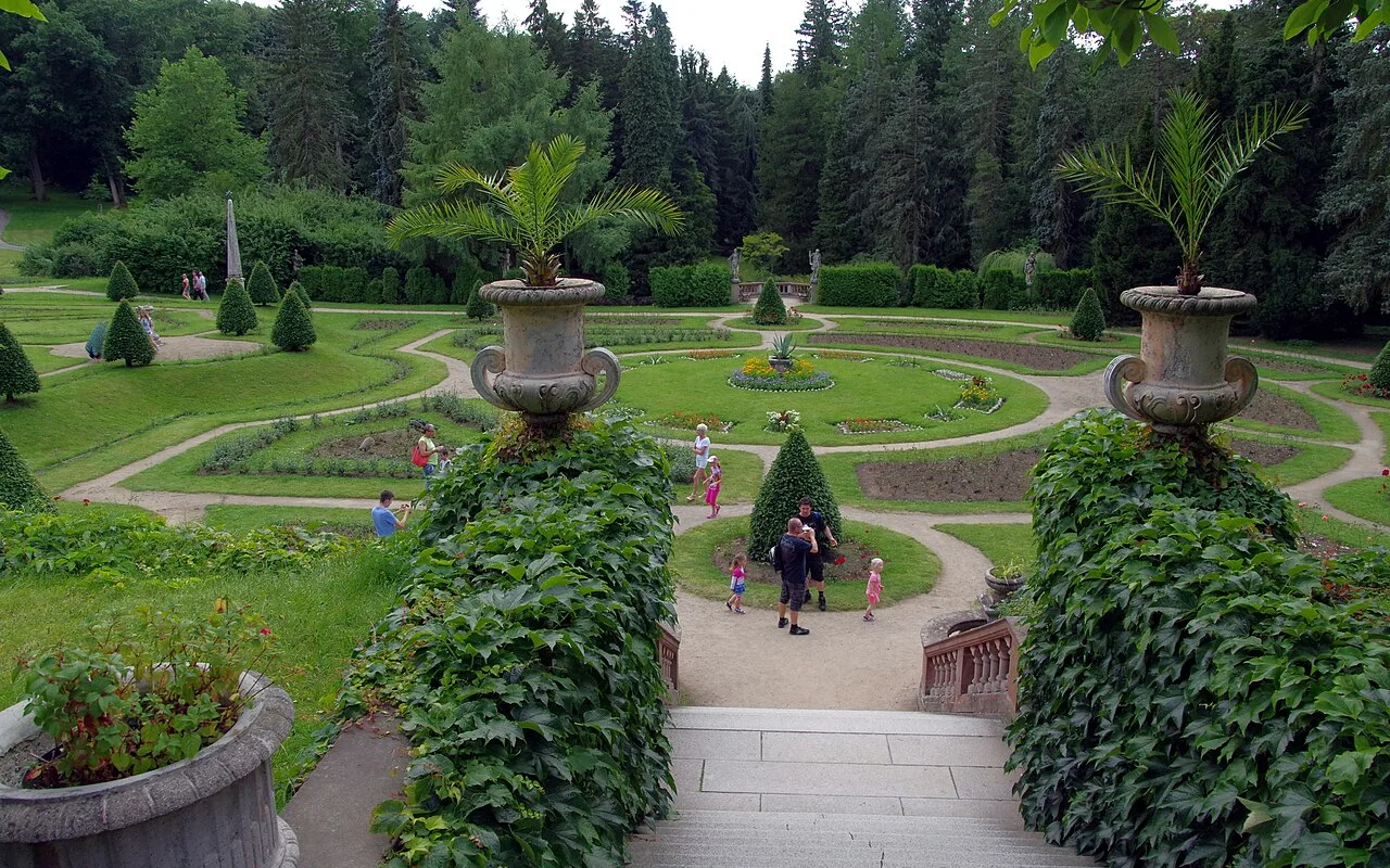 Palms and clipped hedges in the Konopiště rose garden