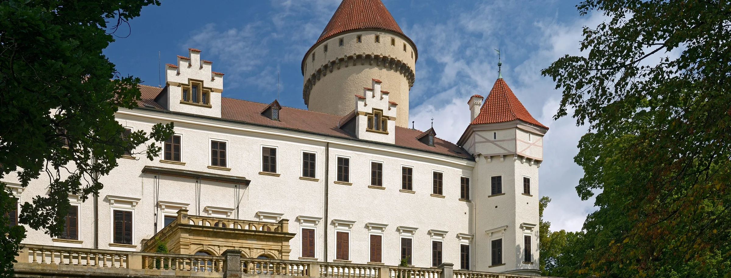 Konopiště Chateau above its terrace, seen across the lawn